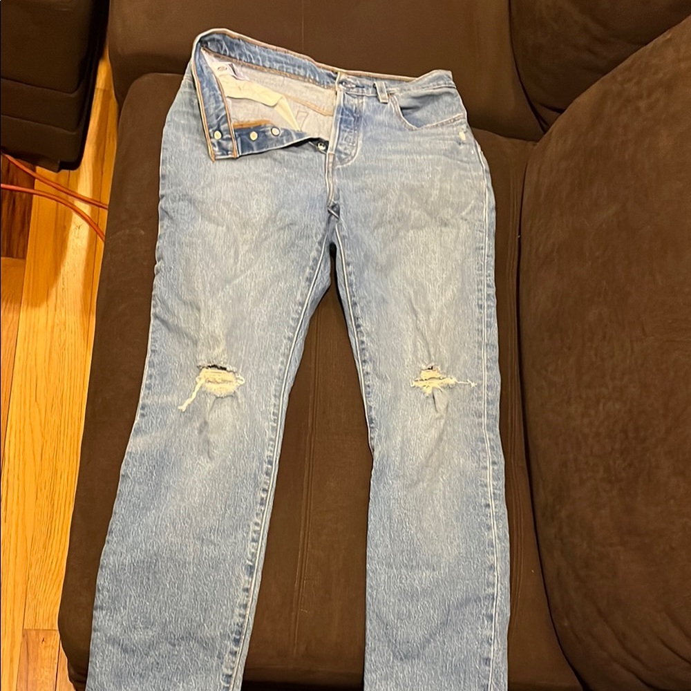 Women’s Levi’s Distressed Blue Jeans